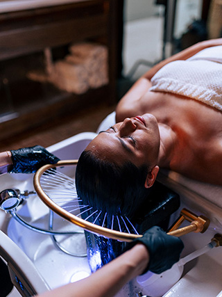 Woman Receiving the Luxury Head Spa Experience Package